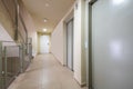 Stairs and elevators in a house with fire doors and stoneware tiles