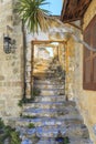 Stairs of entrance of house in historic streets of old town Rhodes Royalty Free Stock Photo
