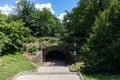 Stairs going Down to a Tunnel and Bridge at Central Park during Summer in New York City Royalty Free Stock Photo