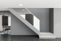 Stairs in gray living room interior Royalty Free Stock Photo