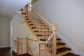 Stairs handrails renovation.wizard for wooden railing for stairs Wooden planks around pole