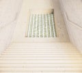 Stairs and hole with money Royalty Free Stock Photo