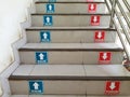 Stairs with Indonesian Writing Stickers "NAIK" and "TURUN" or "Step Up" and "Step Down" Royalty Free Stock Photo