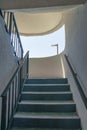 Stairs inside a building with concrete steps and metal railing in Destin Florida Royalty Free Stock Photo