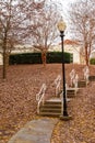 Stairs and lamppost in autumn park Royalty Free Stock Photo