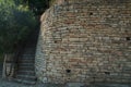 Stairs Leading behind and Ancient Fortification Wall Royalty Free Stock Photo