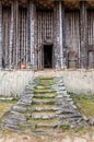 Stairs leading to entrance of wood and bamboo Achum at traditional Fon`s palace in Bafut, Cameroon, Africa