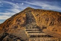 Stairs leading to the mountain top. Walking hike tour in Maderia island, Ponta de sao Lourenco. It is nature background of a Royalty Free Stock Photo