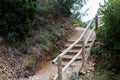 Rock stairs to trek the hill with wooden reiling