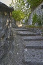 Stairs made of stones in a medieval city .