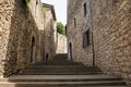 Stairs in a narrow medieval street in Girona Royalty Free Stock Photo