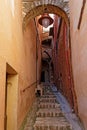 Stairs and narrow passageway under the lamp