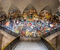 The stairs of National Palace with the famous mural The History of Mexico by Diego Rivera - Mexico City, Mexico Royalty Free Stock Photo