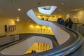 stairs with oval-shaped handrails to access the interior of the Vatican museum.