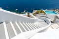 Stairs over a pool in Santorini Royalty Free Stock Photo