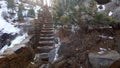 Stairs in the Rocky Mountains on a hiking trail. Stairs are made of rock and mortar.