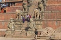 Stairs and sculptures at the Nyatapola temple on Durbar Square of Bhaktapur