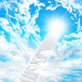 Stairs in sky with clouds and sun Royalty Free Stock Photo