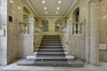 Stairs with steps and marble balustrade on the ground floor of a mansion Royalty Free Stock Photo