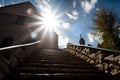 Stairs in sunlight leading up to the church. Way to God. Religious background. Light from sky Royalty Free Stock Photo