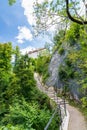 Stairs to the Bled castle, Slovenia. Historical ancient castle building near the lake. Sunny day in summer, blue sky, trees Royalty Free Stock Photo