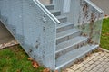 Stairs to a residential building made of stainless steel grid. galvanized stair Royalty Free Stock Photo