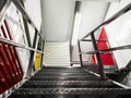 Stairs to second level and open door of self storage facility. Service to keep safe extra belongings. Nobody. Selective focus. Royalty Free Stock Photo