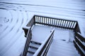 Stairs to a Snow Covered Driveway