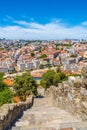 Stairs of the walls of the Castle of Saint George in Lisbon that go down the hill that lead to Martim Moniz Square with aerial Royalty Free Stock Photo