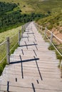 Stairs wooden path of the Puy de DÃÂ´me volcano mountain in france