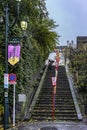 Stairs of Yushima Tenmangu shrine adorned with lanterns for Autumn Chrysanthemum festival.