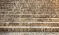 Stairway aged, weathered made from stones. Empty stonework background, close up view with details.