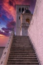 stairway of the basilica of san francesco in the city of assisi at sunset