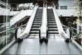 Stairway Electric Escalator of Shopping Mall, Modern Indoor Escalators and Interior Decoration in Shopping Supermarket.