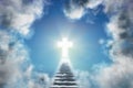 Stairway leading through clouds to heaven and crucifix. Religion, christianity and life after death concept. Royalty Free Stock Photo