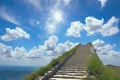 a stairway leading up into a bright blue sky, dream heavenly clouds, generative ai Royalty Free Stock Photo