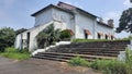 Stairway with the old Three Kings Chapel in India against the blue sunny sky Royalty Free Stock Photo