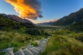 Stairway uphill to see Lake Tasman with stunning views of the mountains and the morning sky and stunning clouds Royalty Free Stock Photo