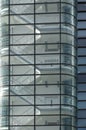 Stairways between the floors of a futuristic modern commercial building behind a curved glass facade Royalty Free Stock Photo