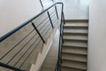 Stairwell in a modern building. Staircases as an emergency evacuation exit from the building in case of fire or emergency. Clean Royalty Free Stock Photo