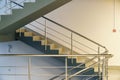 Stairwell in a modern building. Staircases as an emergency evacuation exit from the building in case of fire or emergency. Clean Royalty Free Stock Photo