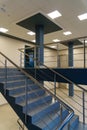 Stairwell in a modern building. Staircases as an emergency evacuation exit from the building in case of fire or emergency. Clean Royalty Free Stock Photo