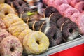 Staked different flavours glazed donuts Royalty Free Stock Photo