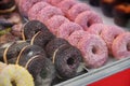 Staked different flavours glazed donuts Royalty Free Stock Photo