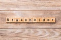 Stakeholder word written on wood block. Stakeholder text on wooden table for your desing, concept Royalty Free Stock Photo