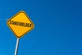 Stakeholder - yellow sign with blue sky