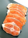 Stakes of salmon on plate Royalty Free Stock Photo