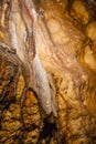 Stalacites and stalagmites on cave walls