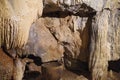 a stalactite in the cave with a pot Royalty Free Stock Photo