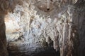 Stalactite formations on the ceiling of a grotto